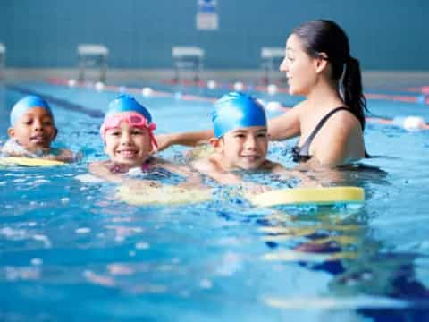 a group of people in a pool