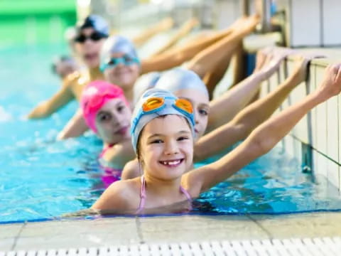 a group of people in a pool