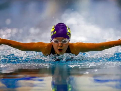 a person swimming in a pool