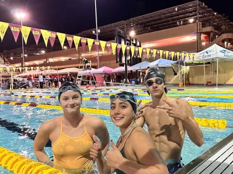 a group of people in a pool