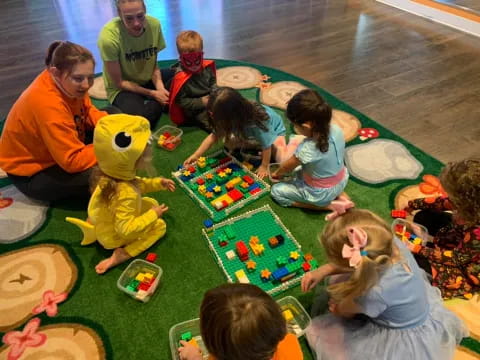 a group of children playing with toys