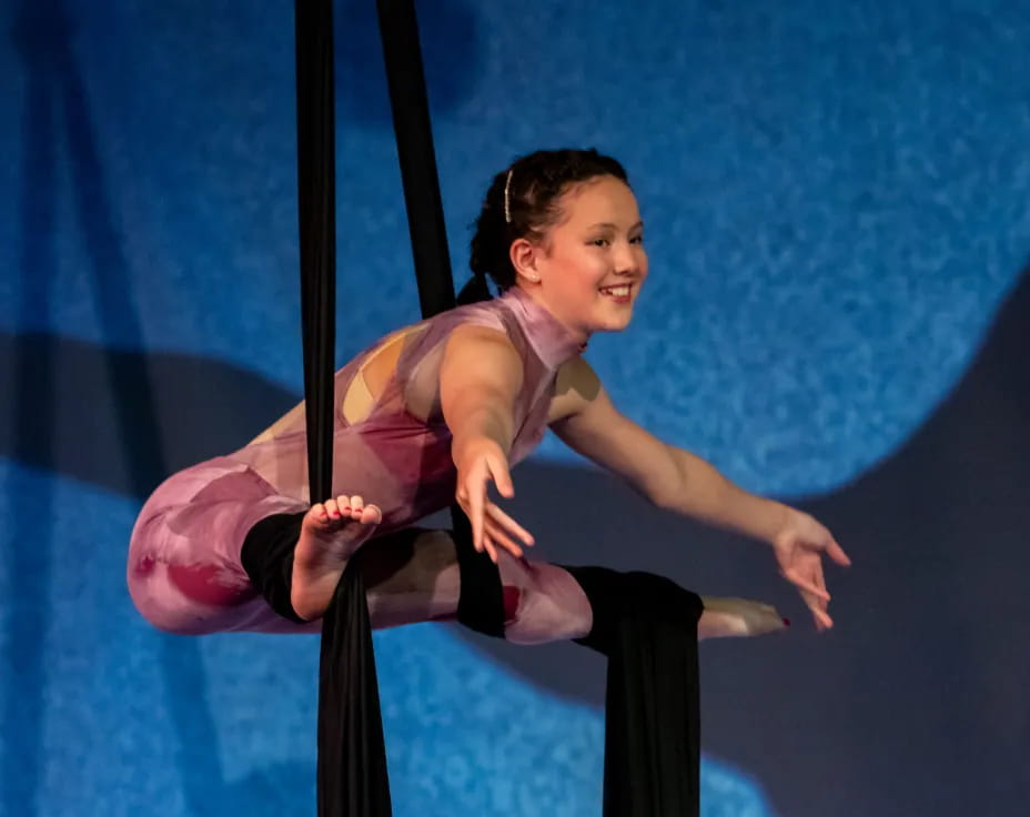 a person sitting on a swing