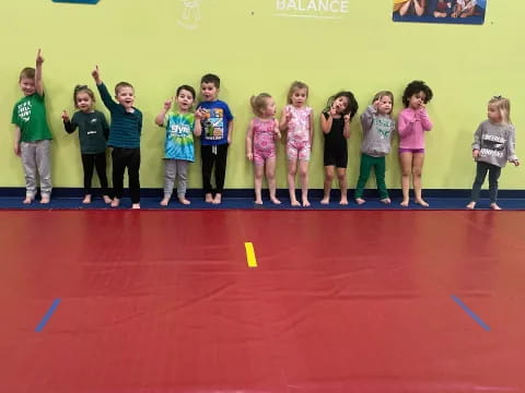 a group of children posing for a photo