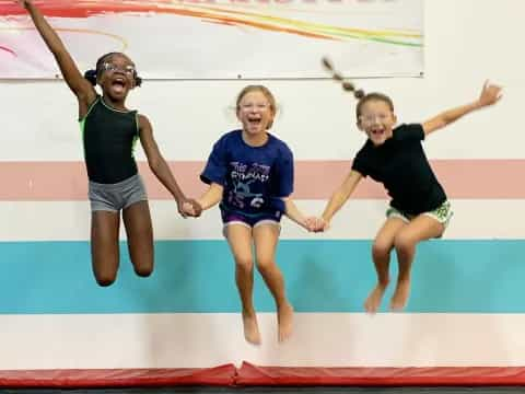 a group of girls jumping in the air