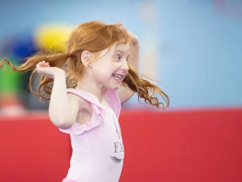 a woman with her hair blowing in the wind