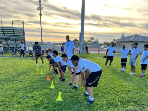 a group of people playing football