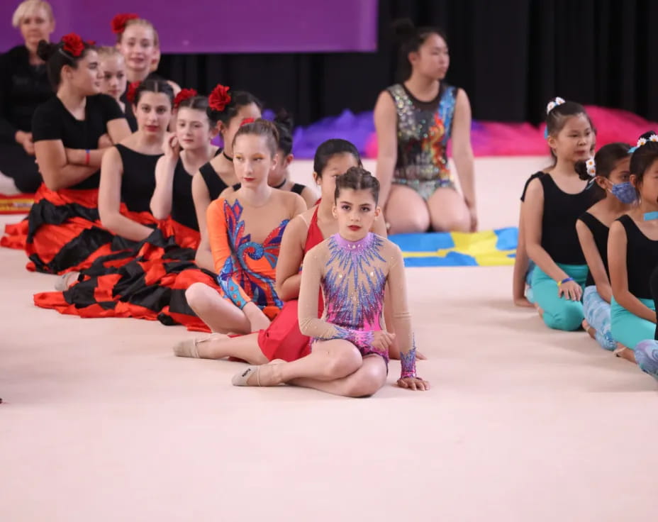 a group of children sitting on the floor