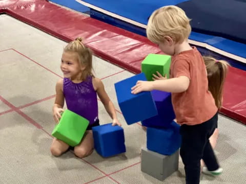 a couple of children playing with toys