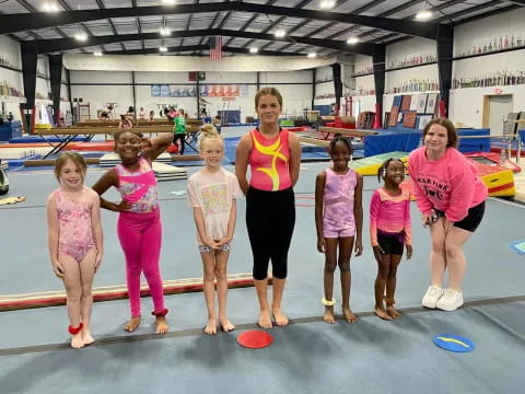 a group of women in a gym