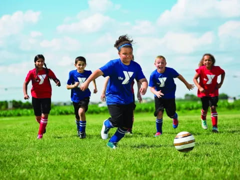 a group of girls playing football