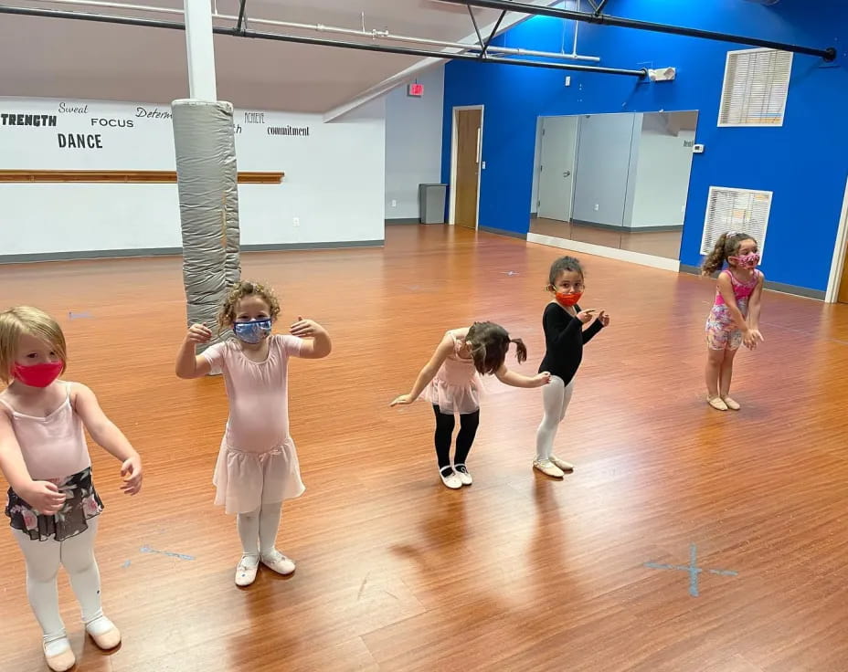 a group of children dancing