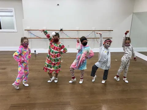 a group of children dancing