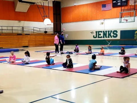 a group of people in a gym