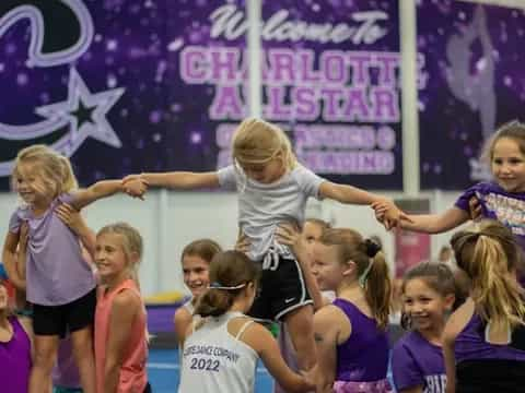 a group of girls in a gym