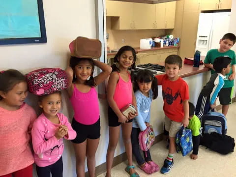 a group of children posing for a photo