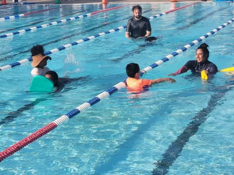 a group of people in a pool