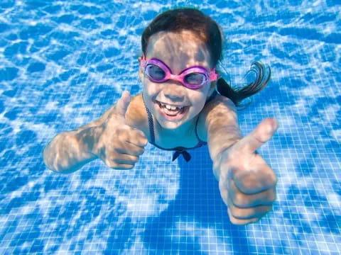 a child in a pool