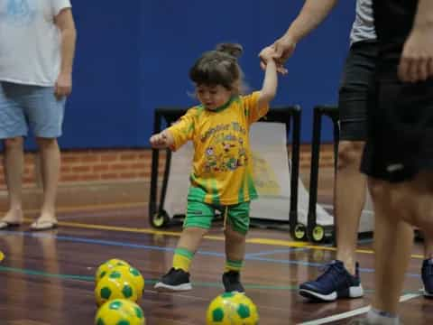 a boy playing with a toy