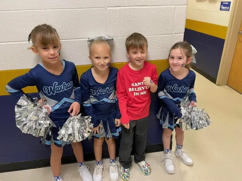 a group of children posing for a photo