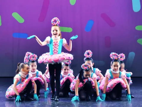 a group of girls on a stage