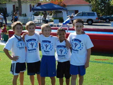 a group of boys in matching t-shirts
