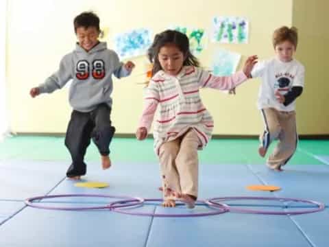 children playing on a mat