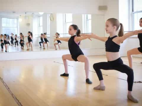 a group of girls exercising