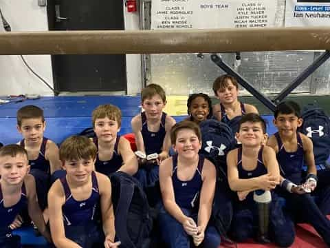 a group of boys in a pool