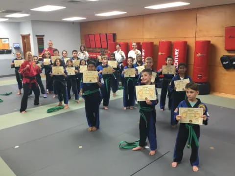 a group of children holding signs