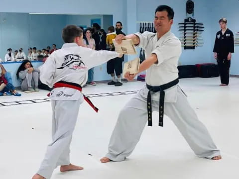 two men in karate uniforms