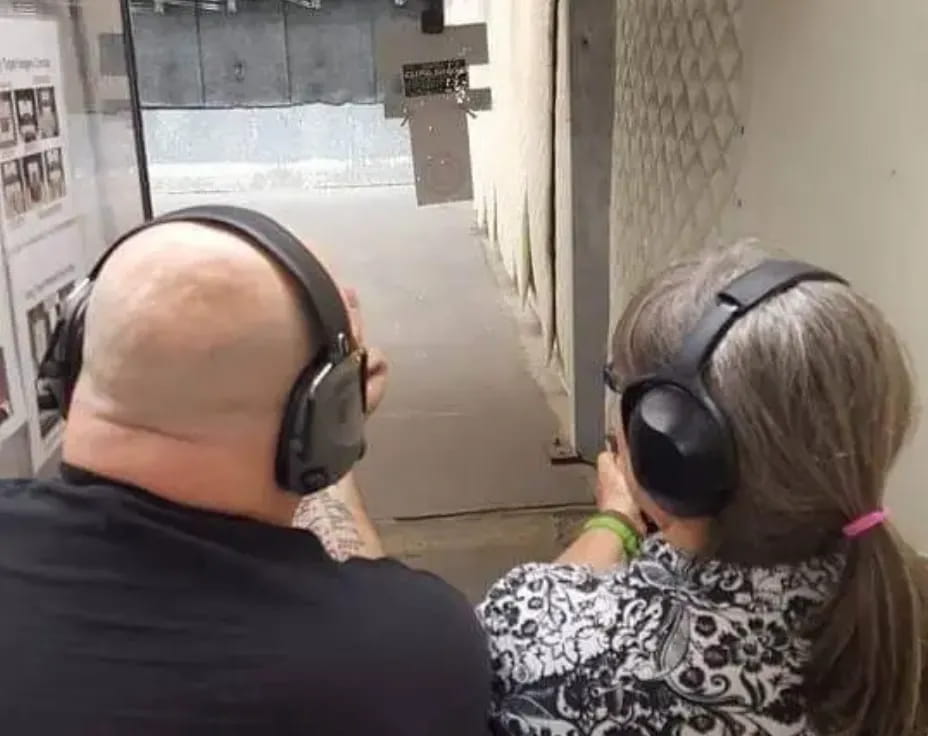 a man and woman wearing headphones