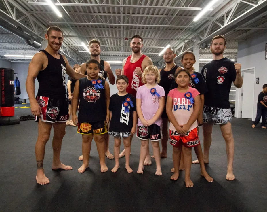 a group of people posing for a photo