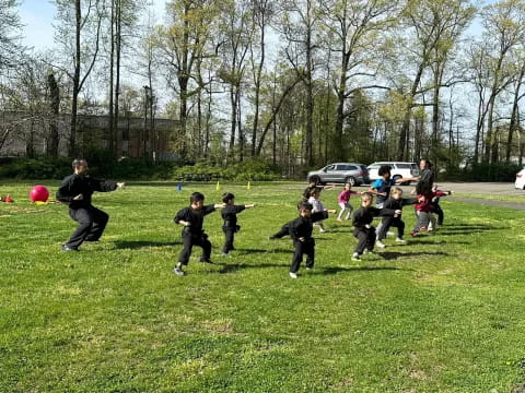 a group of kids playing football