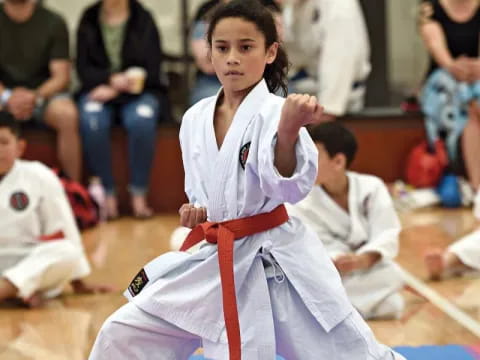 a person in a karate uniform