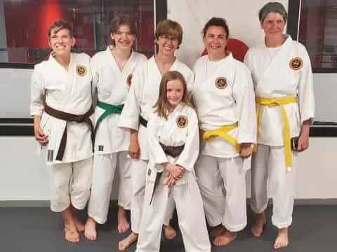 a group of people wearing karate uniforms
