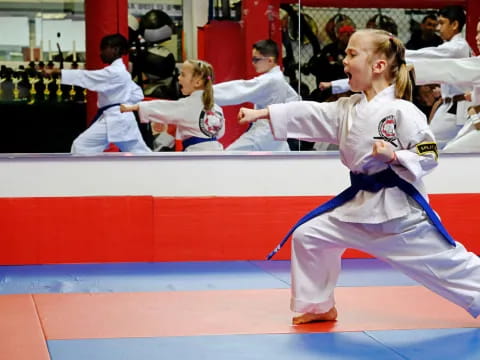 a man in a karate uniform