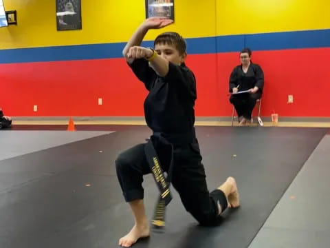 a boy doing a handstand