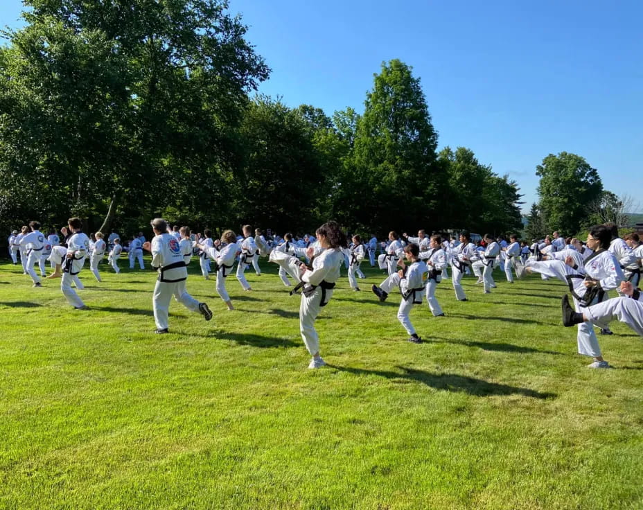 a group of people in white uniforms