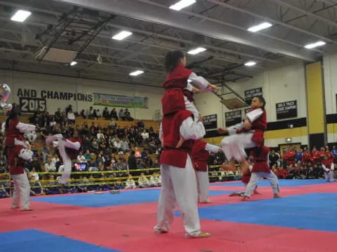 a group of people in a karate class