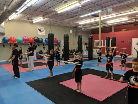 a group of kids in a gym