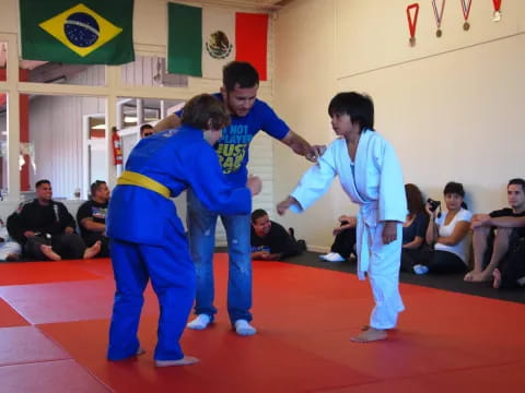 a group of people in karate uniforms