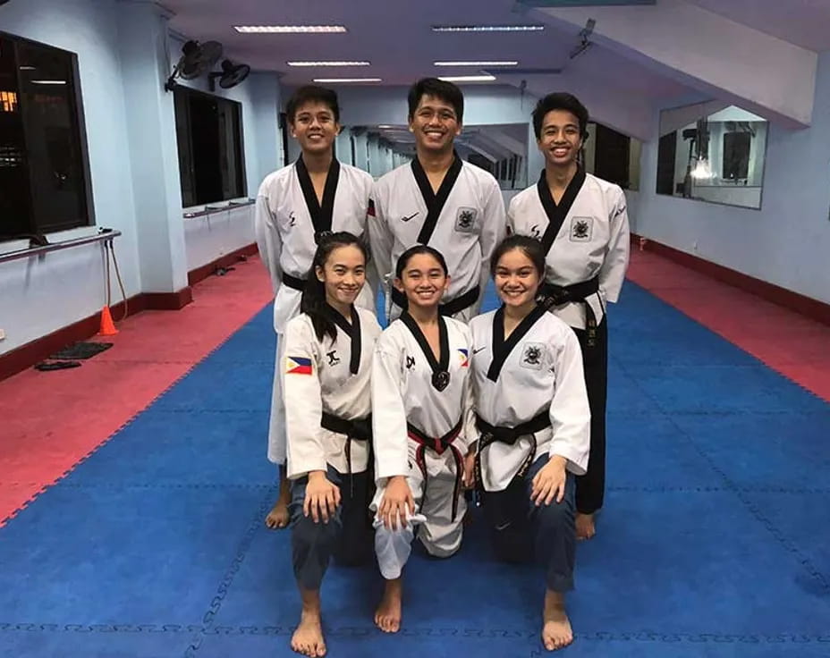 a group of people wearing karate uniforms