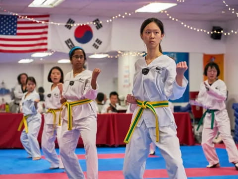 a group of people in karate uniforms