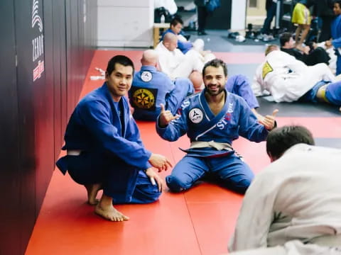 a group of people in blue karate uniforms