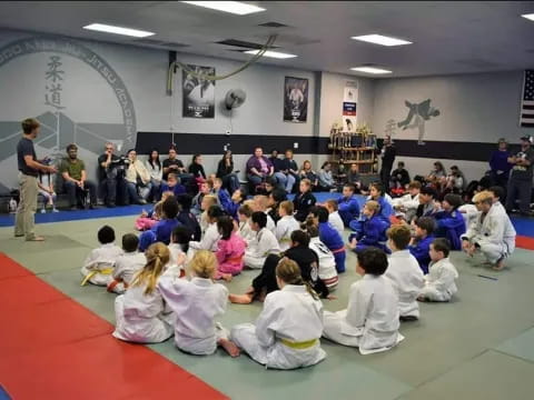 a group of people sitting in a room