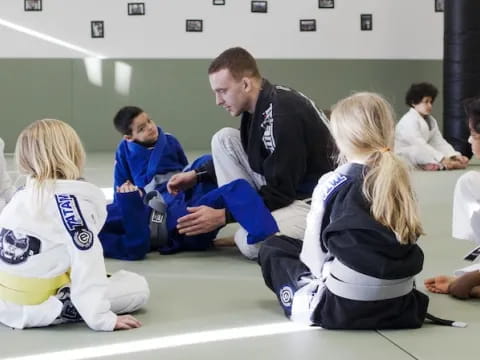 a group of people sitting on the floor