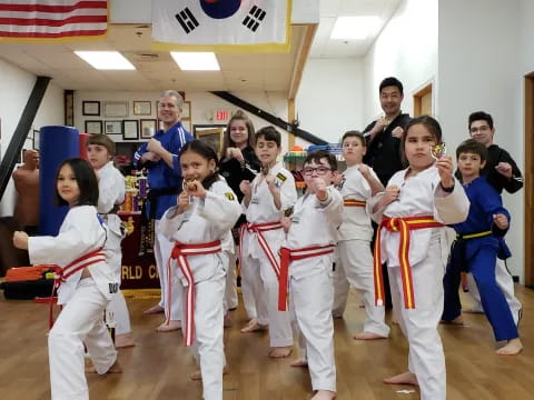 a group of people in karate uniforms