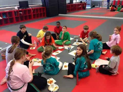 a group of people eating at a table