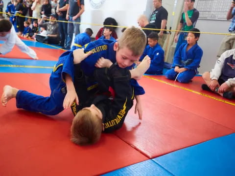 a group of kids in a gym