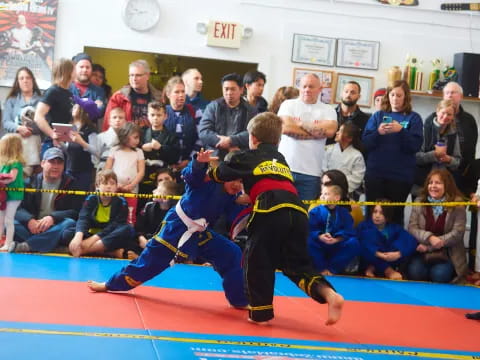 two people in a fighting ring